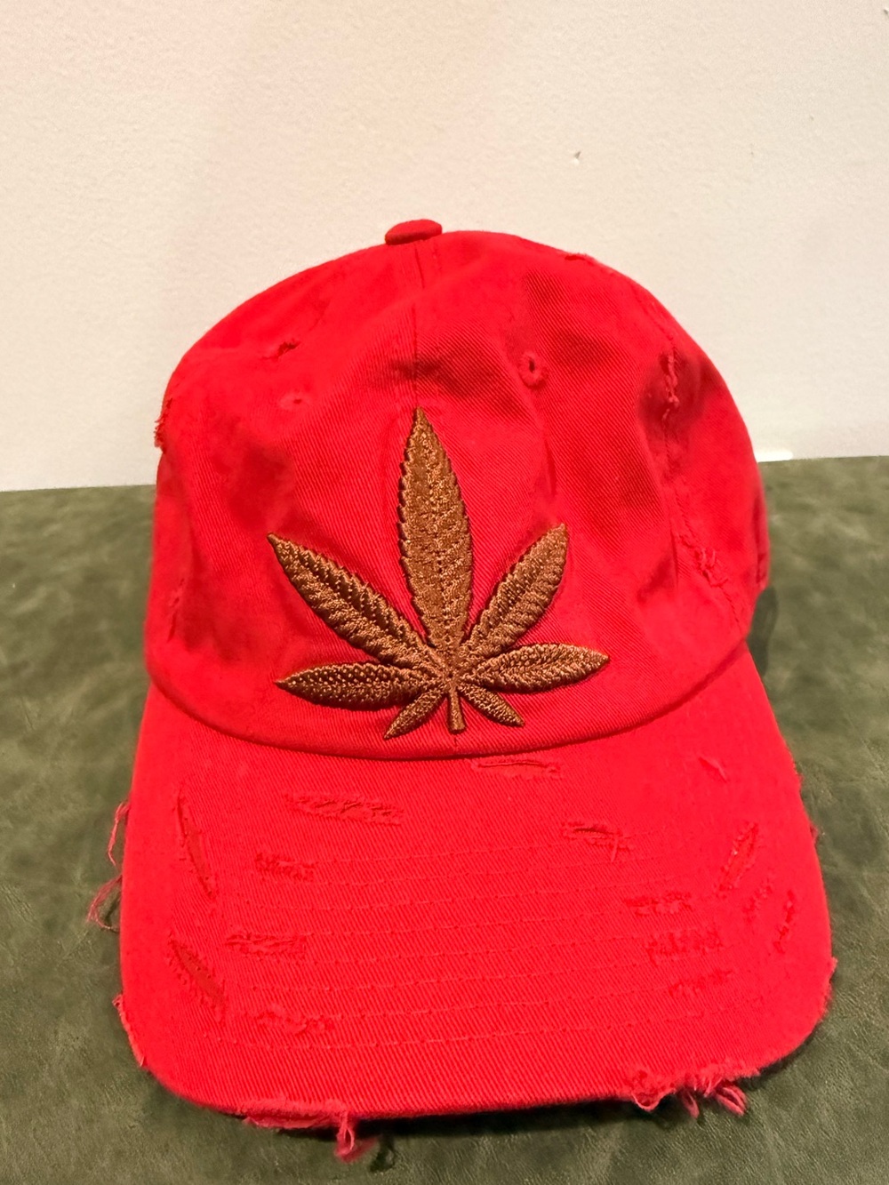 Red Distressed Baseball Cap with Brown cannabis Leaf embroidered